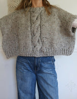 Knitted Poncho Worn By A Woman thumbnail
