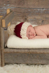 Knitted Hat Worn By A Baby thumbnail