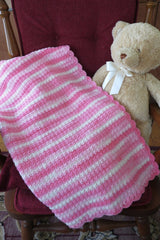 Crochet Blanket Beside A Teddy Bear thumbnail