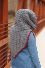 Back view of hooded crochet cowl, with hood up. Back extension has triangular point ending at waist. thumbnail