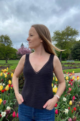 Front view of crochet tank top showing v-neck and eyelet trim. thumbnail