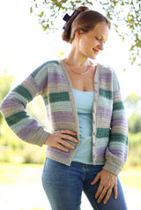 Front view of crochet cardigan worn open over tank top and jeans. thumbnail