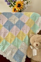 Crochet Blanket Beside A Teddy Bear thumbnail