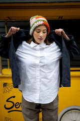 model in colorful crochet hat thumbnail