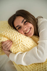 girl hugging pillow thumbnail