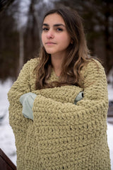 girl wrapped in crochet blanet/poncho thumbnail