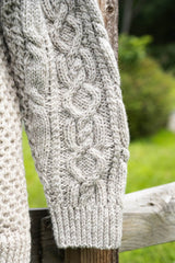 Close up of cardigan sleeve. thumbnail