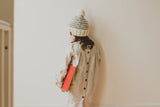 Knitted Hat Worn By A Baby thumbnail