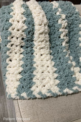 Blue and cream striped blanket thumbnail