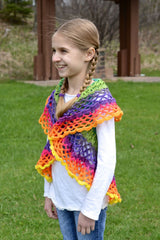 girl wearing a colorful crocheted mandala circular vest outdoors thumbnail