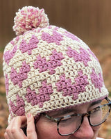 Crochet Hat Worn By A Woman thumbnail