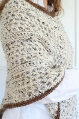 Crochet Poncho Worn By A Woman thumbnail