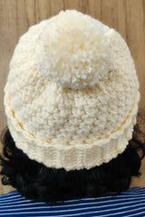 Crochet hat with pom thumbnail