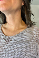 closeup of knit sweater thumbnail