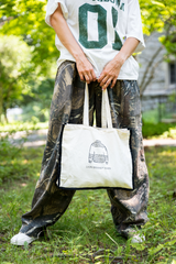 woman holding fair isle canvas tote  thumbnail