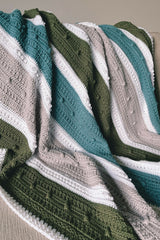 Baby Blanket draped over sofa thumbnail