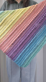 Crochet Scarf Held By A Woman thumbnail