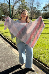 Crochet Shawl Held By A Woman thumbnail