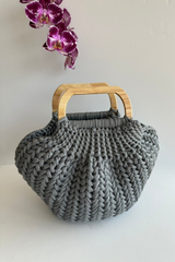gray purse on white background thumbnail