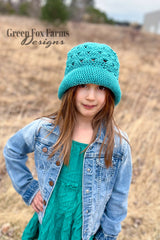 Crochet Hat Worn By A Child thumbnail