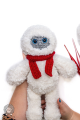 handmade fluffy white yeti toy with a red scarf and grey face thumbnail
