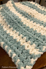 Blue and cream striped blanket thumbnail