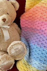 Crochet Blanket Beside A Teddy Bear thumbnail