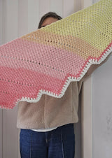 Crochet Scarf Held By A Woman thumbnail