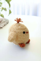 side view of fluffy chick thumbnail