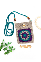 Crochet Pouch Beside A Plant thumbnail