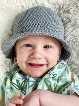 Crochet Bucket Hat Worn By A Baby thumbnail