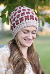 Woman outside, wearing hat thumbnail