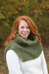 Woman in white shirt and green cowl thumbnail