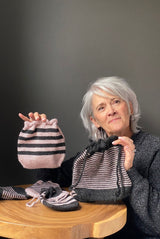 Woman holds two knit bags thumbnail