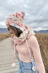 Close up of crochet bonnet on model looking down. thumbnail
