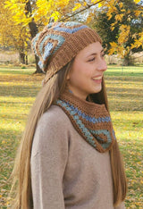 Model wears crochet hat and cowl outdoors.  thumbnail