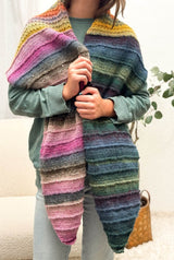 Model wears textured shawl against cream backdrop.  thumbnail