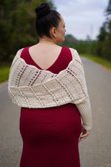 Back view of white crochet wrap with back cross-crossed.  thumbnail