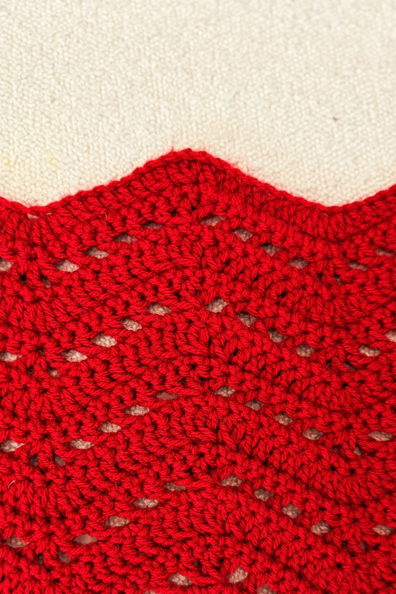 Close up of border on red chevron ripple afghan. 