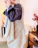 Side view of draped crochet vest, with longer fronts. thumbnail