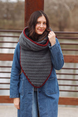 Front view of woman wearing oversized grey cowl over long denim coat, with hood down found neck.  thumbnail