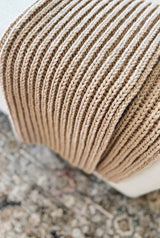 Close up of ribbed textured on knit throw.  thumbnail