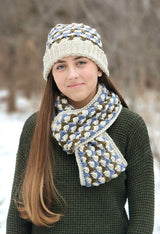 Woman wears crochet beanie with doubled brim in cream, denim, and olive, with matching scarf.  thumbnail