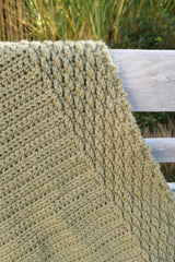 Closeup of crochet border on olive green blanket.  thumbnail