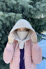 Woman wears combination hood/cowl with the cowl portion pulled over her lower face.  thumbnail
