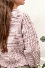 Back view of crochet sweater showing drop shoulder construction.  thumbnail