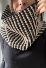 Close up of cowl worn by woman with a black top.  thumbnail