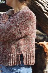 Side view of knit cardigan, showing dropped shoulders and split hem at side.  thumbnail