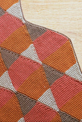 Close up of afghan border, showing wavy edge from diamond motifs.  thumbnail