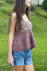 Side view of knit tank top, showing peplum on lower body.  thumbnail